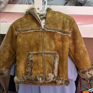 Size 7 girls jacket.  Zipper works but is missing handle.